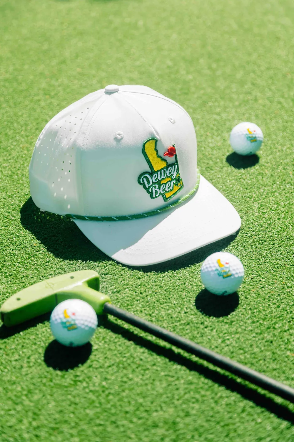 Dewey beer custom golf hat and branded golf balls by anthem branding
